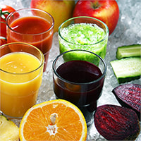 Raw Food Detox, glasses of juice and fruit